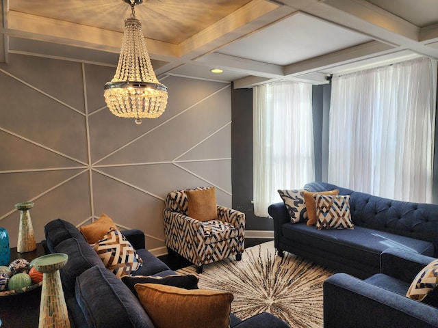 living room with beamed ceiling, coffered ceiling, and a chandelier