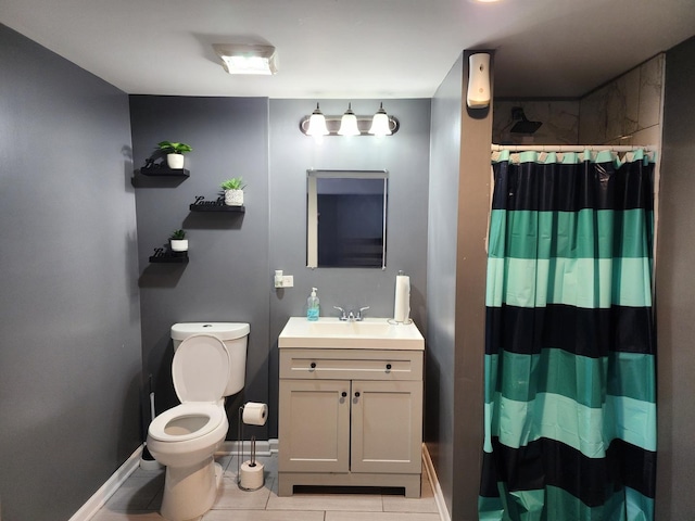 bathroom with vanity, tile patterned flooring, a shower with curtain, and toilet