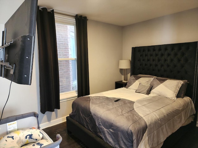 bedroom featuring dark wood-type flooring