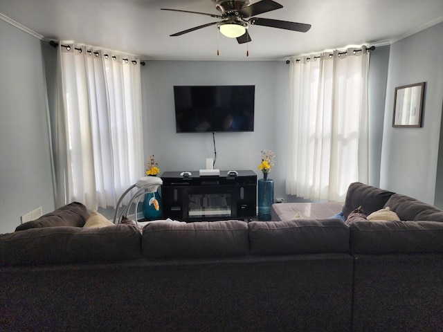 living room with ceiling fan