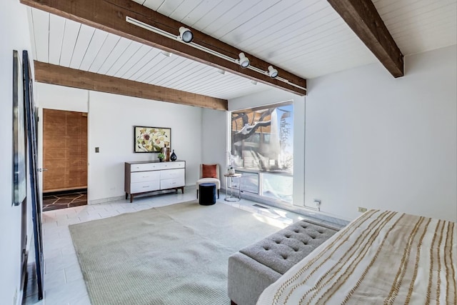 bedroom featuring beam ceiling