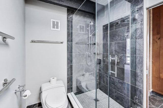 bathroom featuring a stall shower, visible vents, and toilet