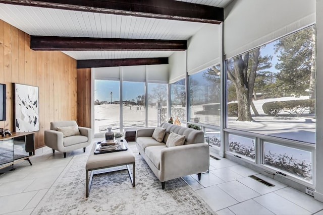 sunroom / solarium with beam ceiling and visible vents