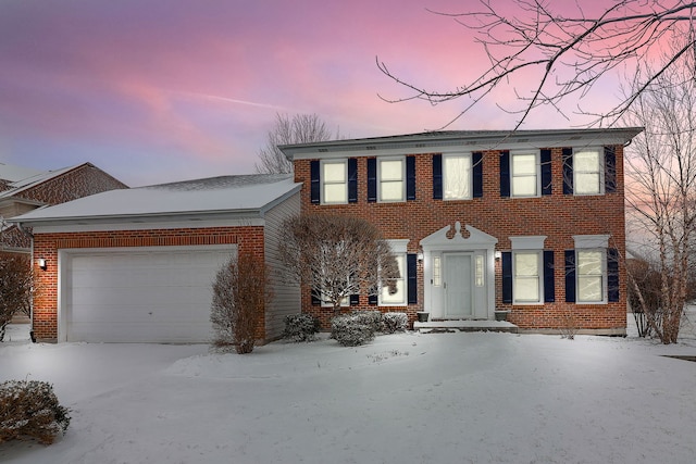 colonial-style house with a garage