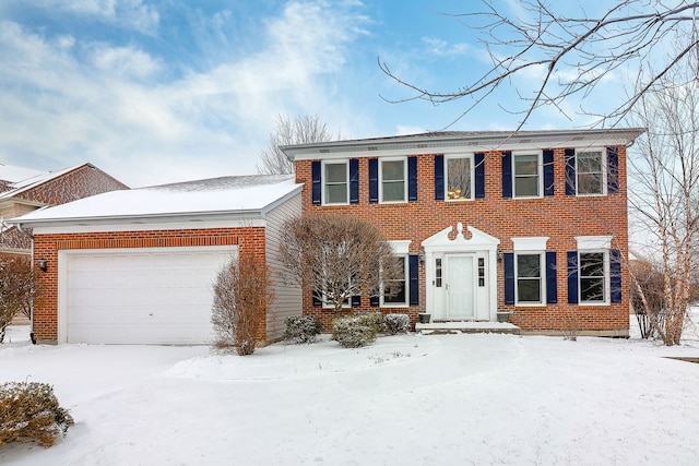 colonial house featuring a garage