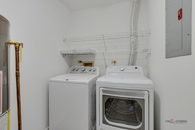 washroom featuring electric panel and washer and dryer