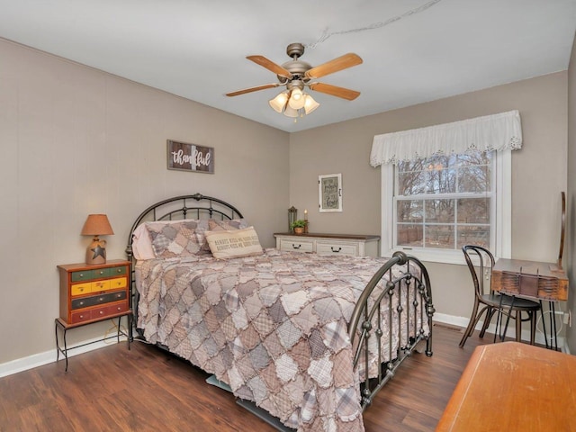 bedroom with ceiling fan and dark hardwood / wood-style flooring