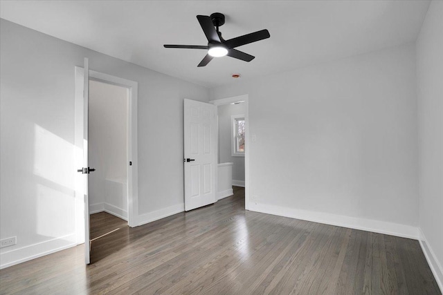 unfurnished bedroom with ceiling fan and hardwood / wood-style floors