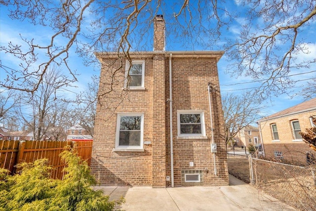 rear view of house featuring a patio area