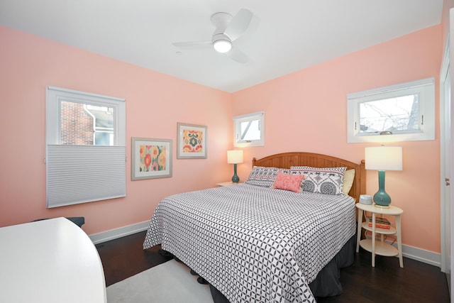 bedroom featuring dark wood-type flooring and ceiling fan