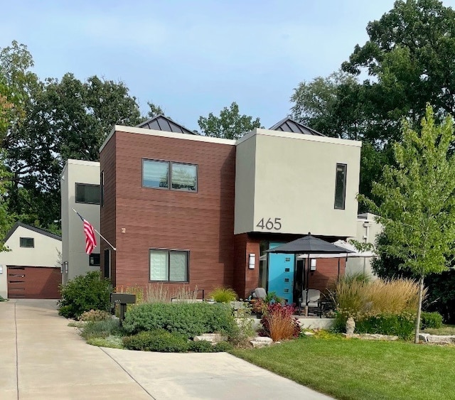 modern home with a front yard