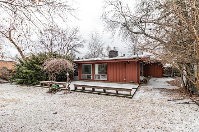 back of property featuring cooling unit