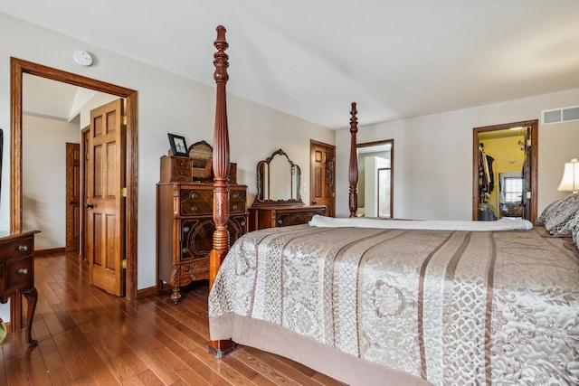 bedroom featuring dark hardwood / wood-style floors