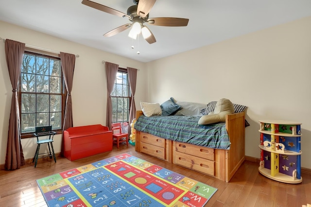 bedroom featuring ceiling fan and wood-type flooring