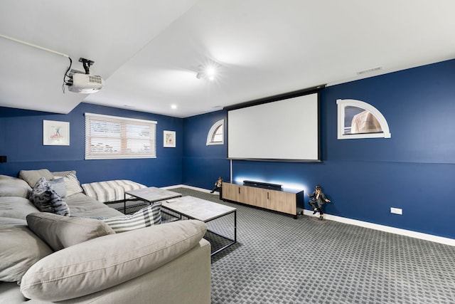 home theater room with carpet flooring