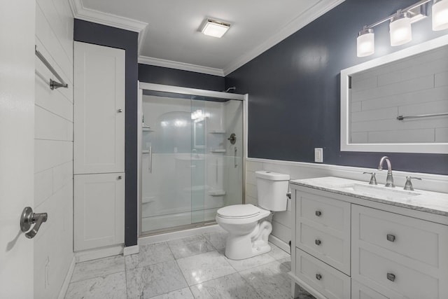 full bathroom with a stall shower, toilet, marble finish floor, crown molding, and vanity