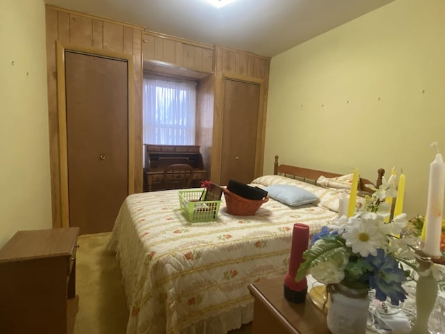 bedroom featuring two closets