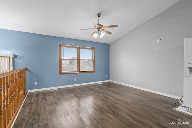 unfurnished room featuring lofted ceiling, dark hardwood / wood-style floors, and ceiling fan