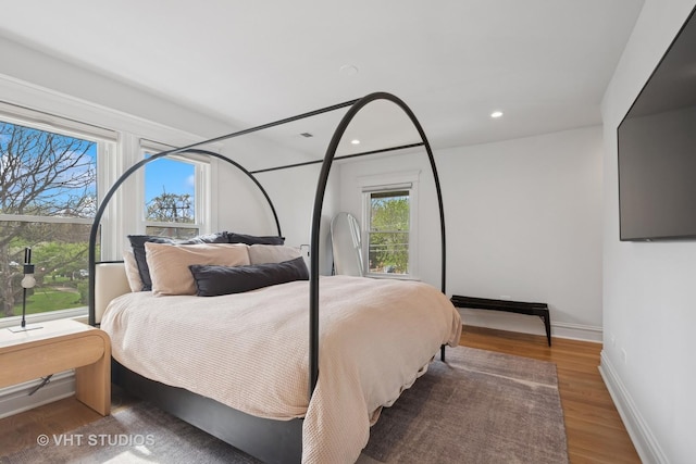 2645 Prairie Ave, Evanston, IL 60201 - bedroom with recessed lighting, baseboards, and wood finished floors
