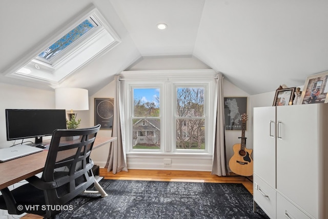 2645 Prairie Ave, Evanston, IL 60201 - office area featuring lofted ceiling with skylight and wood finished floors