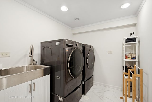 2645 Prairie Ave, Evanston, IL 60201 - washroom with washing machine and dryer, crown molding, a sink, and marble finish floor