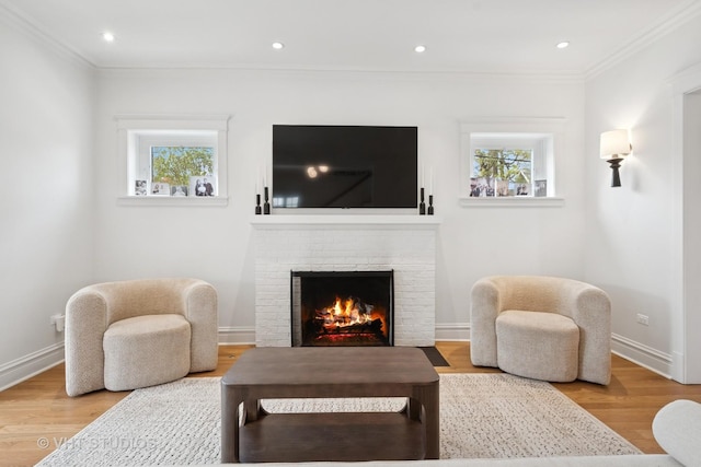 2645 Prairie Ave, Evanston, IL 60201 - living room with a brick fireplace, plenty of natural light, and wood finished floors