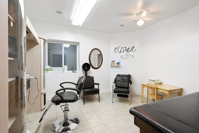 interior space with ceiling fan