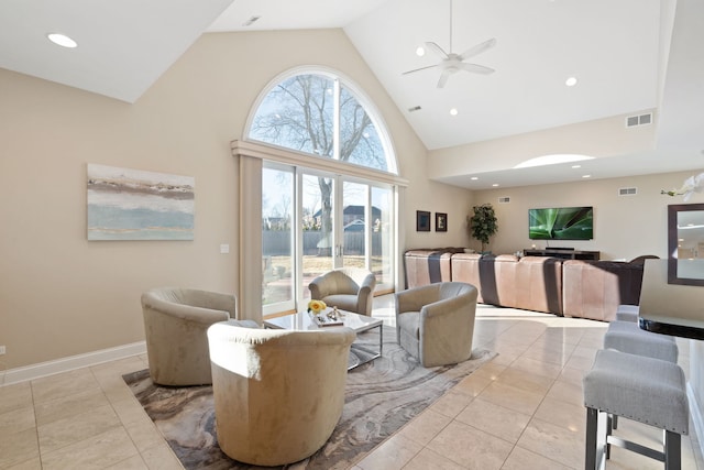 living room featuring high vaulted ceiling, ceiling fan, and light tile patterned flooring