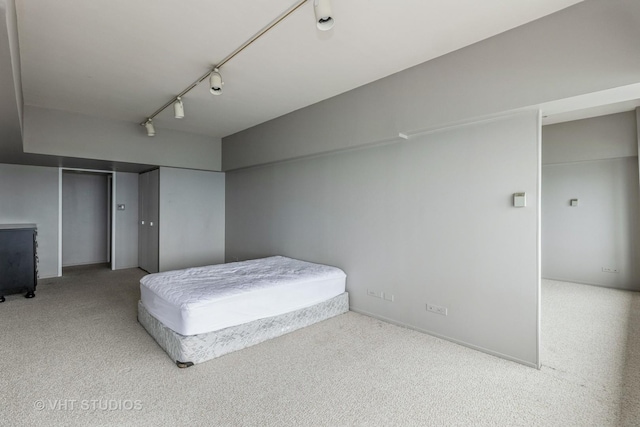 175 E Delaware Pl Unit 4503, Chicago, IL 60611 - bedroom with carpet flooring and track lighting