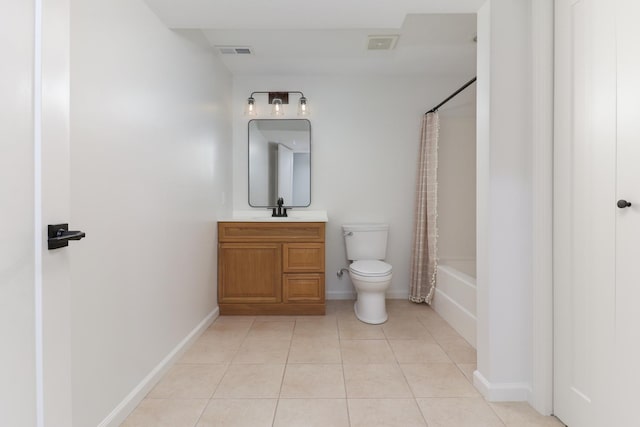 bathroom with tile patterned floors, visible vents, vanity, and toilet
