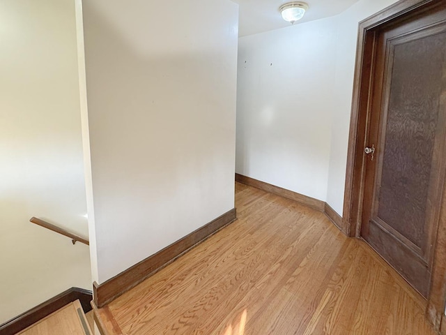 spare room featuring light wood-type flooring