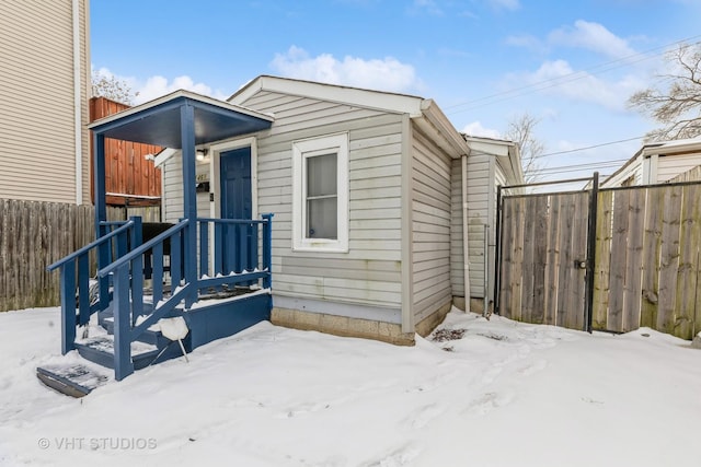 view of front of property with fence