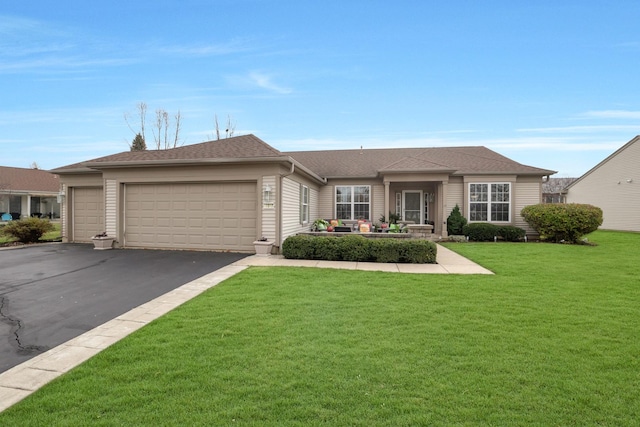 ranch-style house with a garage and a front yard