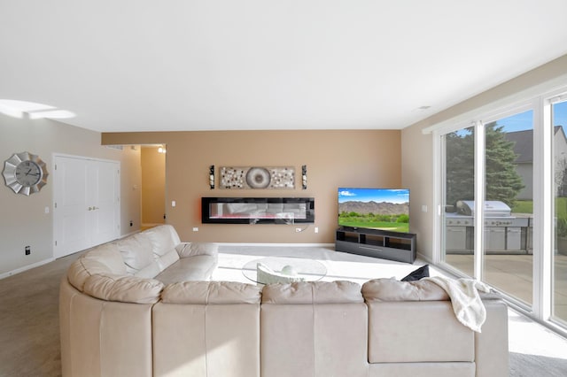 living room featuring light colored carpet