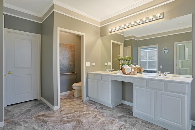 bathroom featuring vanity, ornamental molding, and toilet