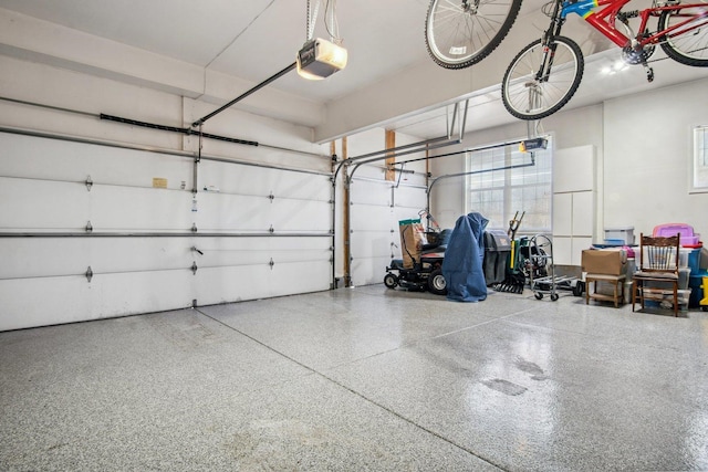 garage featuring a garage door opener