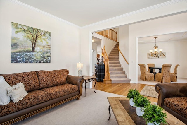 living room with stairway, a chandelier, crown molding, and wood finished floors