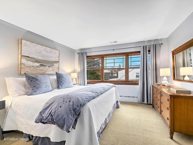 bedroom with light carpet, a baseboard radiator, and visible vents