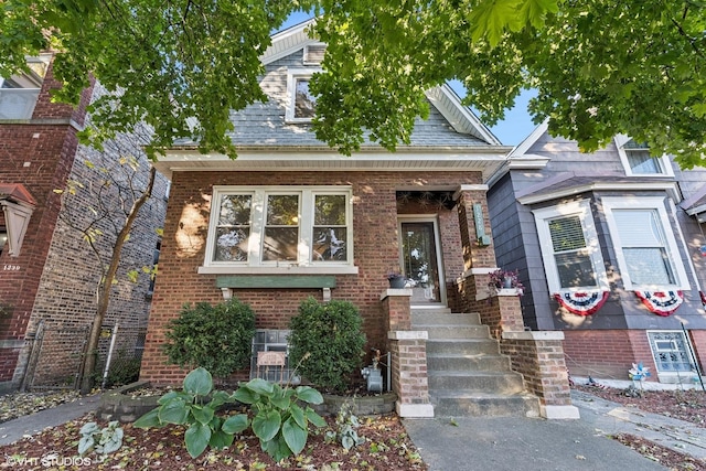 view of front of home with brick siding