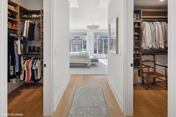 spacious closet with wood finished floors