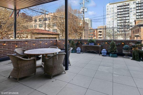 view of patio with outdoor dining area