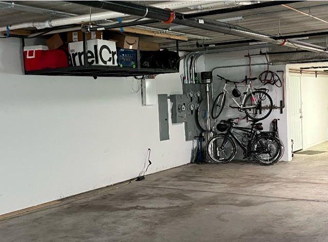 garage featuring bike storage and electric panel