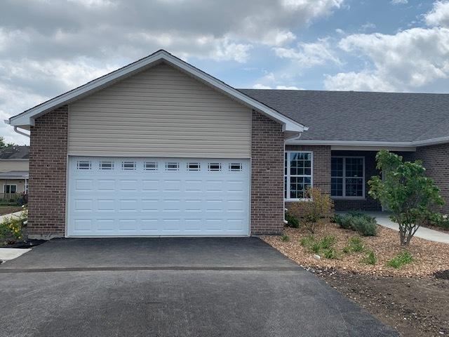 single story home with a garage