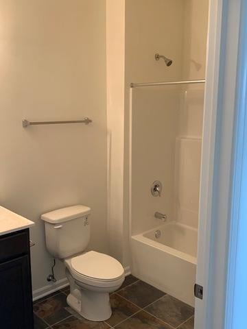 488 Ridge Ln, Bolingbrook, IL 60440 - full bathroom with vanity, tile patterned floors, toilet, and shower / bath combination