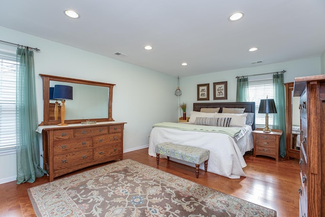 bedroom with wood-type flooring