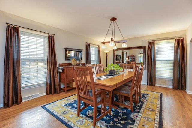 dining room featuring light wood-type flooring