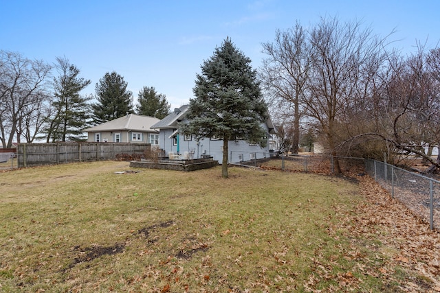 view of yard featuring a fenced backyard