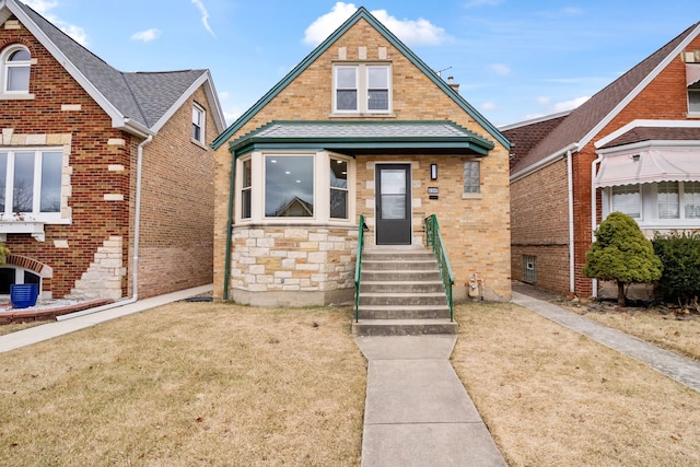 view of front of house with a front lawn