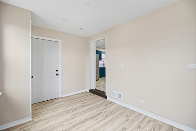 unfurnished bedroom with light hardwood / wood-style flooring