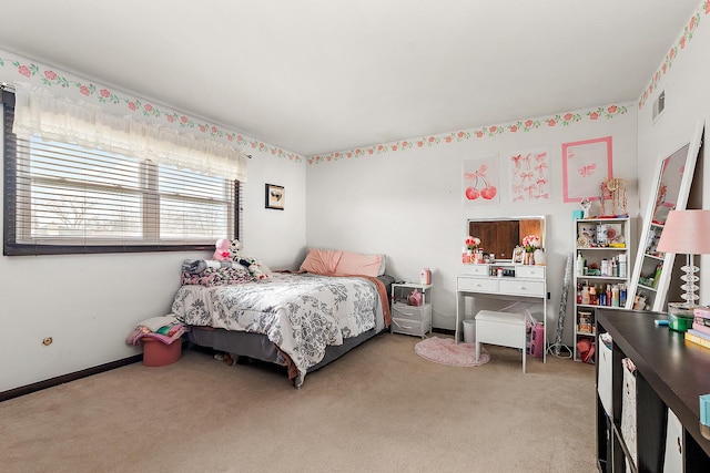 bedroom featuring light colored carpet